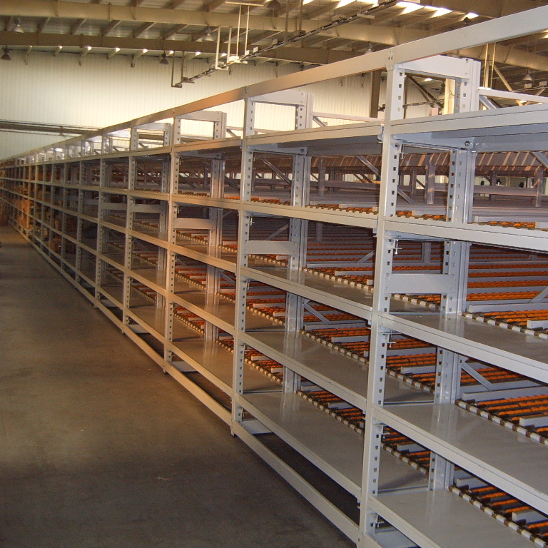 Narrow aisle carton flow rack rail with forklift and wood pallet