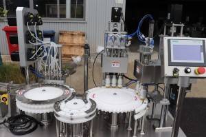 Test tube filling and capping machine