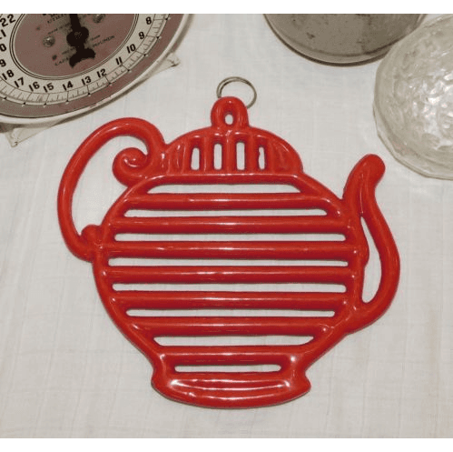 Vintage Red Enamel Tea Kettle Cast Iron Trivet Heavy Piece with Unique Design