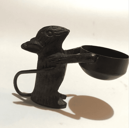Cast iron mouse candle holder