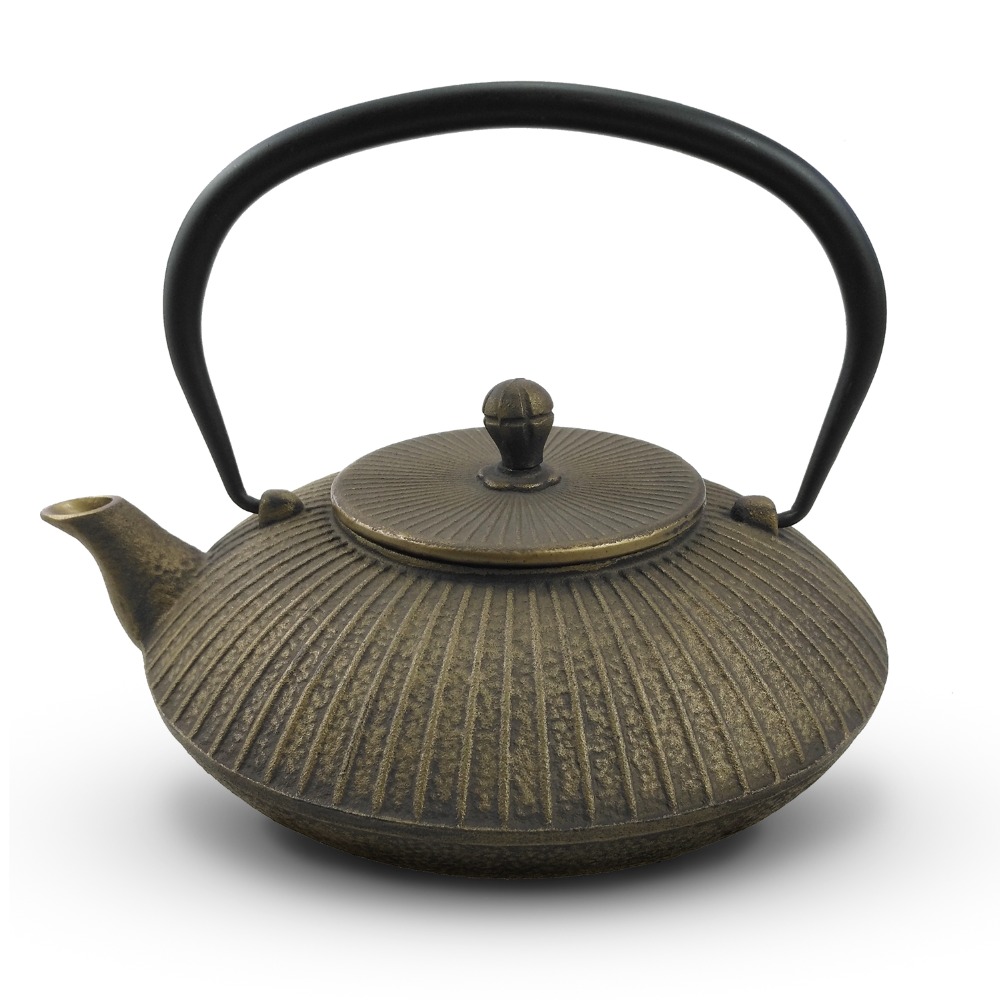 copper color cast iron tea pot