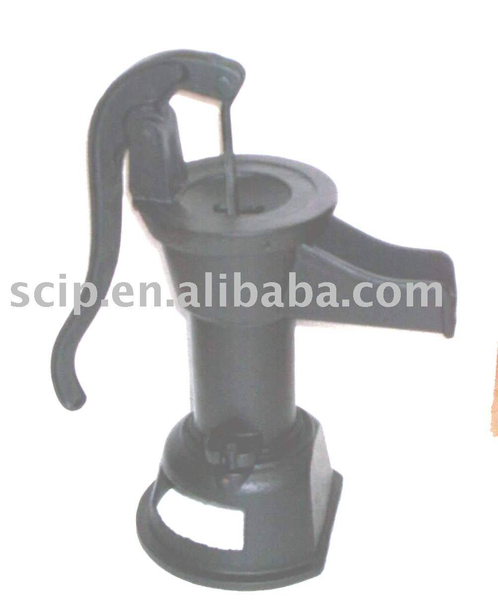 hand-made and antique cast iron water pump