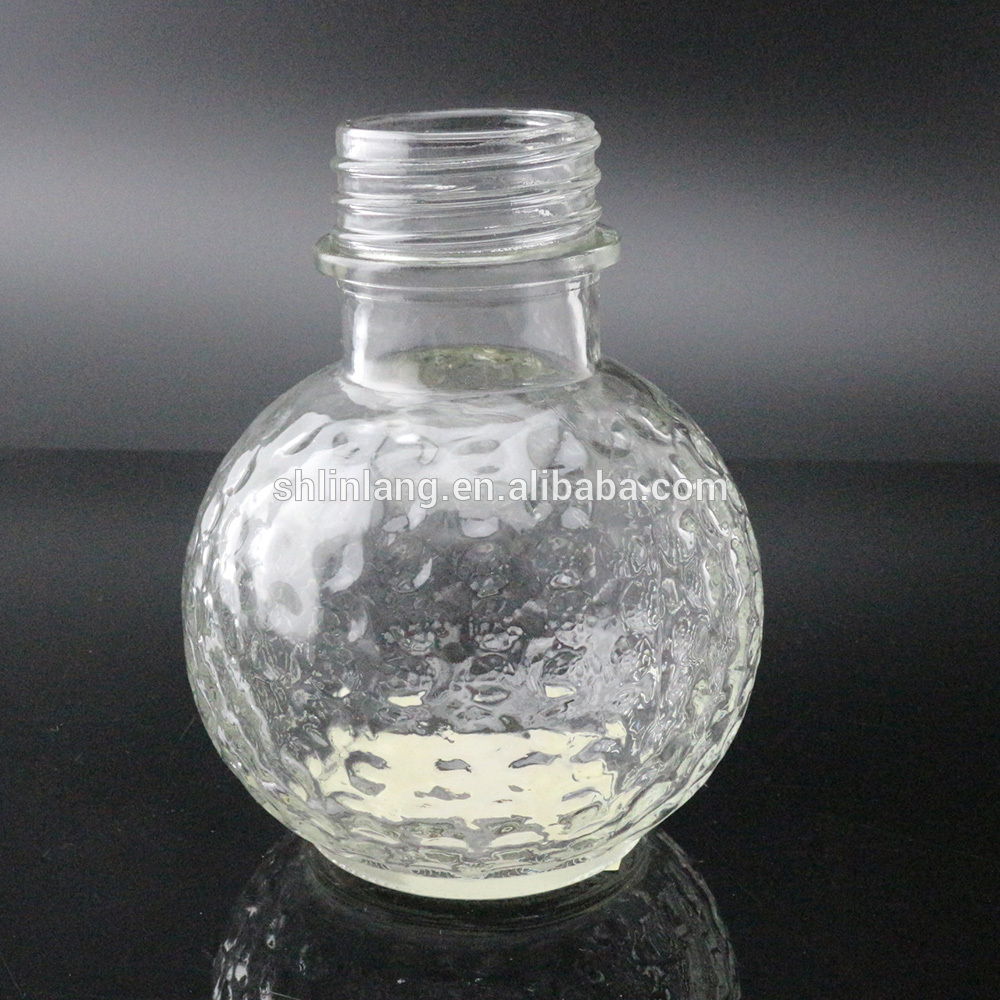 Linglang ball shaped glass oil lamp with embossment