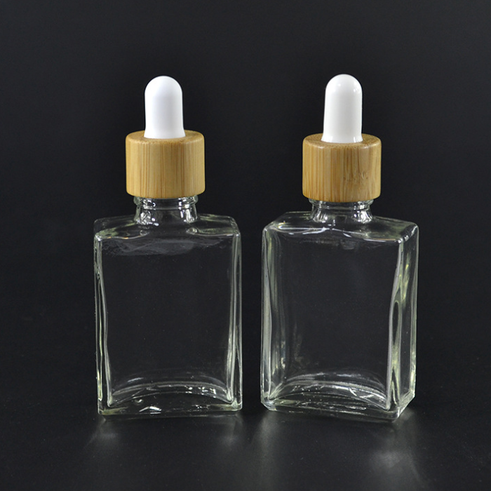 Download China Hot 5ml 10ml 15ml 20ml 30ml 50ml 60ml 100ml Bamboo Cap Essential Oil Bottle Matte Black Red Frosted Glass Bamboo Dropper Bottle Manufacturer And Supplier Linlang