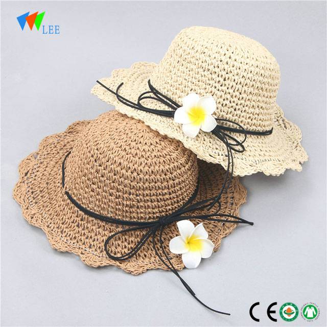 children handmaking woven beach sun protection straw hat