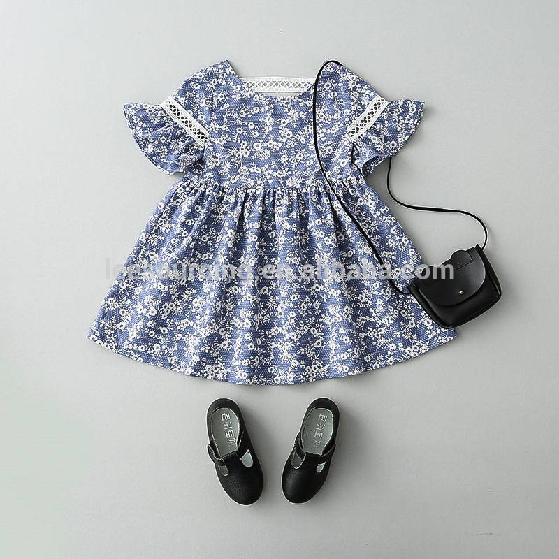 a girl's cotton print blue and white porcelain dress with broken flowers
