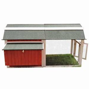 Red  wooden chicken coop with corners of the roof