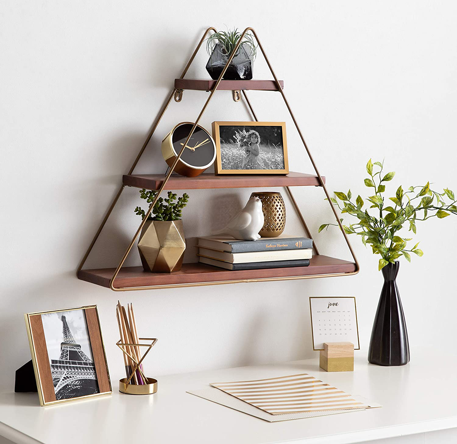 https://www.ekrhome.com/tilde-small-three-tiered-triangle-floating-metal-wall-shelf-walnut-brown-and-gold-product/