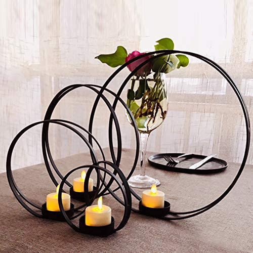 https://www.ekrhome.com/black-candle-holders-for-tea-light-haunted-candelabra-prop-set-of-4-for-votive-tealight-candles-with-metal-ring-shape-product/