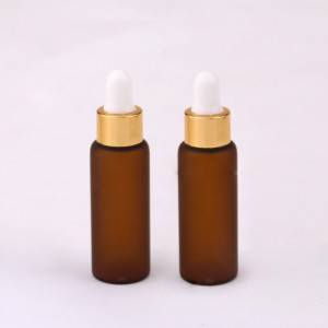 Frosted amber glass dropper vials with gold dropper cap