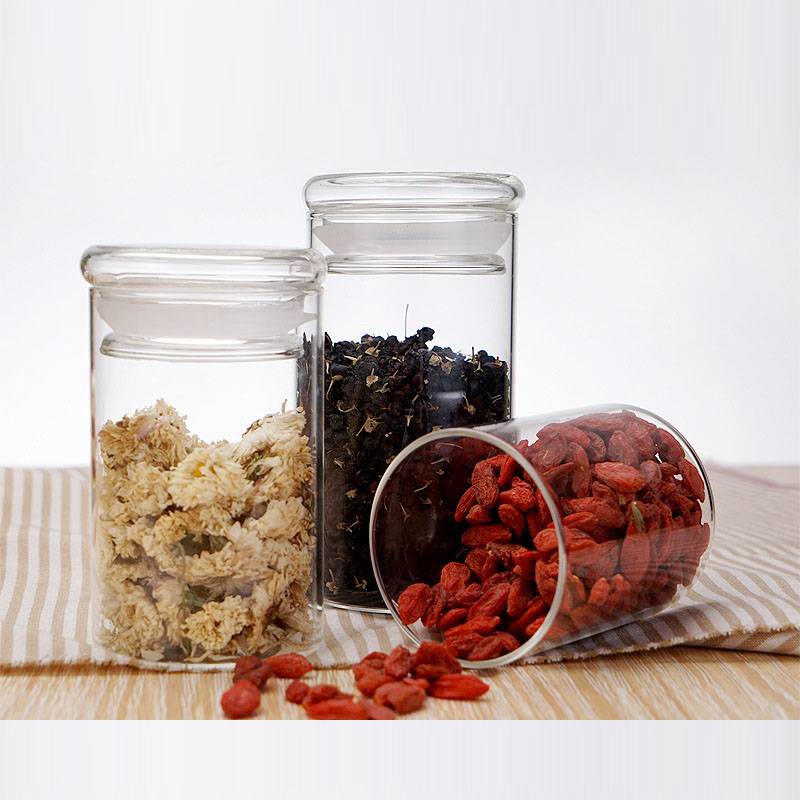 high borosilicate glass cylinder storage jar with glass sealing lid for food , nuts and tea packing Featured Image