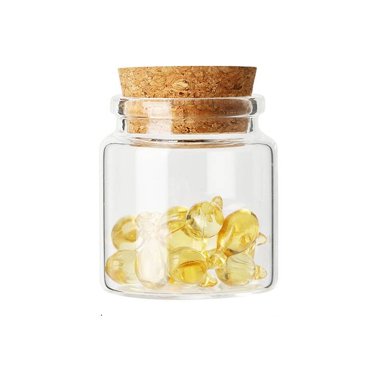 Capsule packing glass bottle with cork lid Featured Image