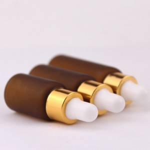 Frosted amber glass dropper vials with gold dropper cap