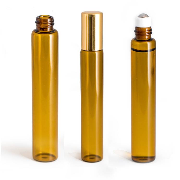 amber glass roller bottle with metal roller  and shiny gold color cap Featured Image