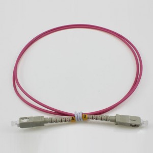 AB "UPC-SC UPC mm SX OM4 3.0mm patch cord raudona violetinė