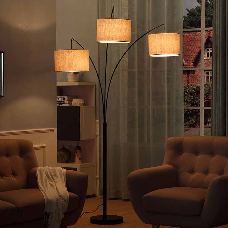 https://www.goodly-light.com/black-tall-multiple-head-arc-lamp-with-3-fabric-shade-hanging-lighting-for-reading-offices-modern-3-arm-floor-light-for-standing-behind-the-living-room-sofa-gl-flm03.html