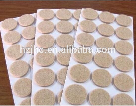 Adhesive polyester needle punched nonwoven felt for furniture pads