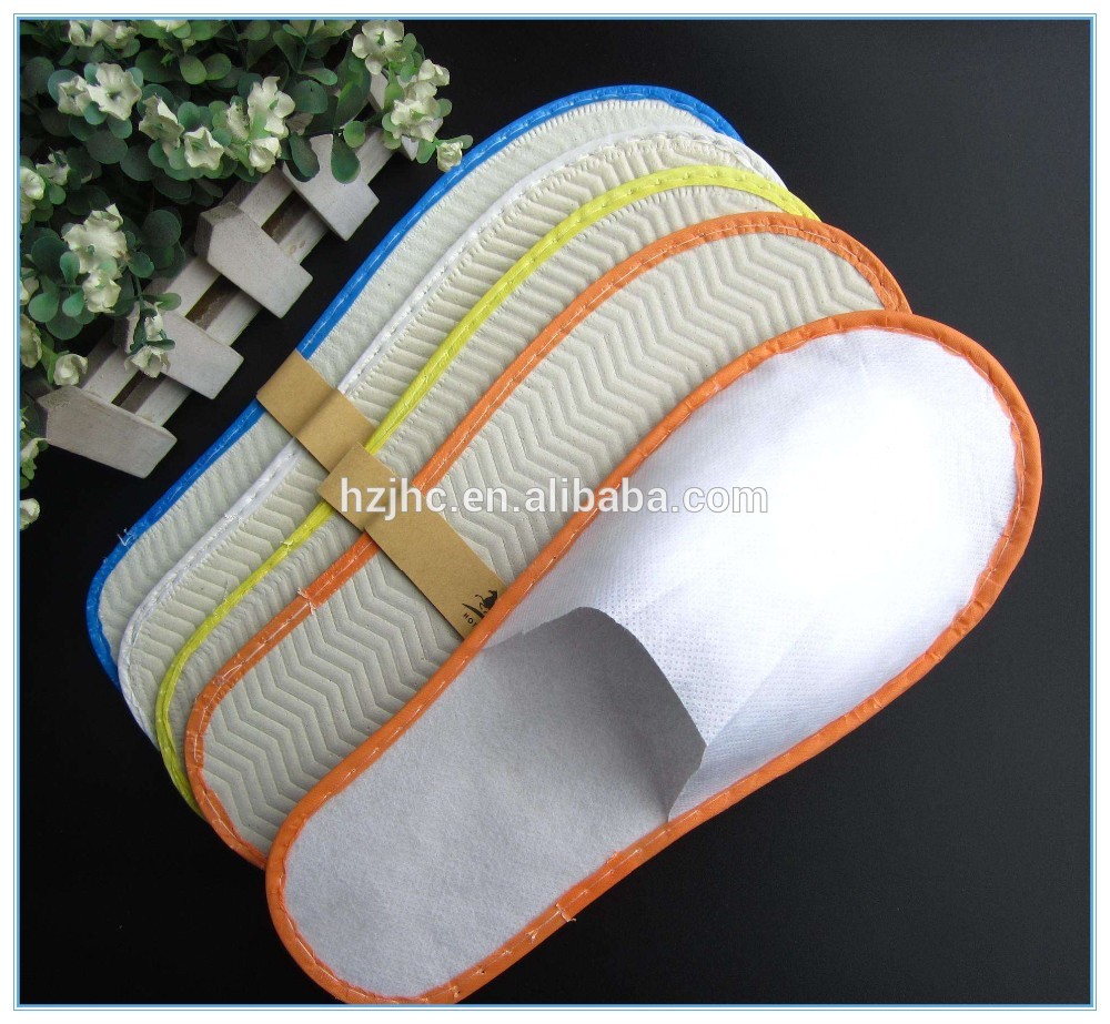 Best selling spunlace hotel disposable man/woman nonwoven slippers