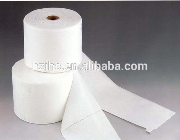 Needle punched cellulose/polyester laminated nonwoven fabrics