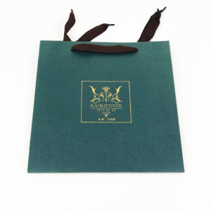 Bolsa de papel de lujo verde con logotipo de lámina caliente
