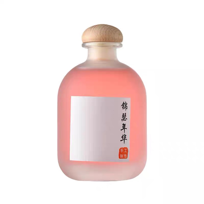 Wholesale 250ML 375ML 500ML Cute Glass Bottles for Juice Coffee Wine with Wooden Corks Featured Image