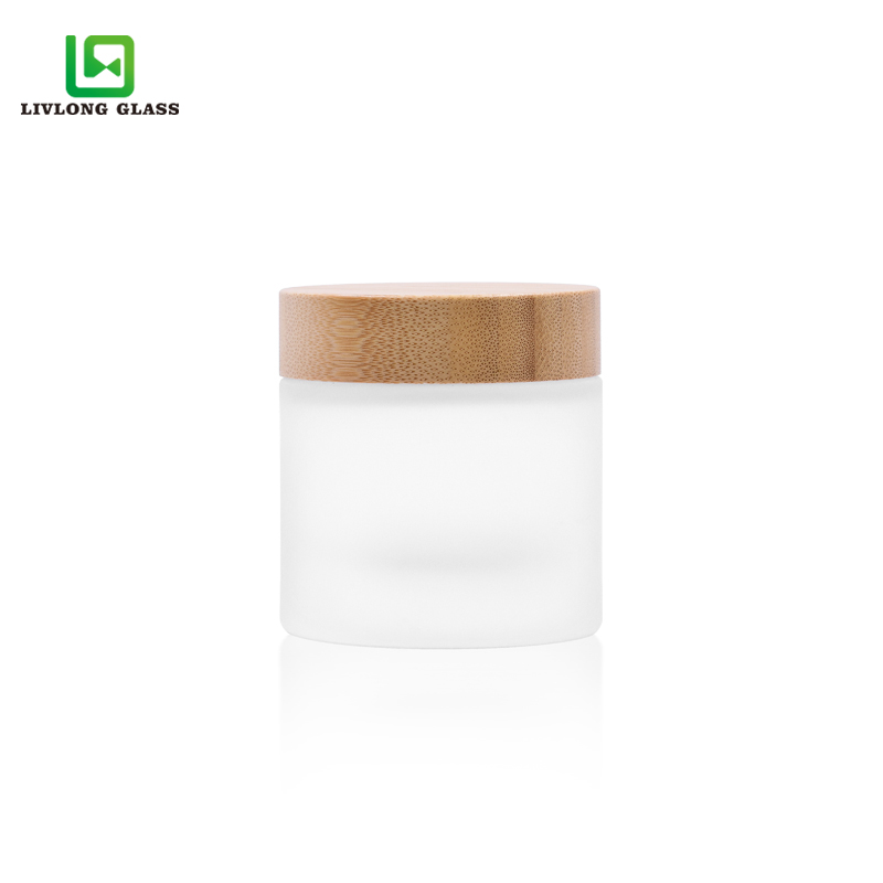 eco-friendly 100g Cosmetic packaging round  frosted glass cream jar 100ml with wooden cap Featured Image