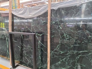 White vein dark green marble