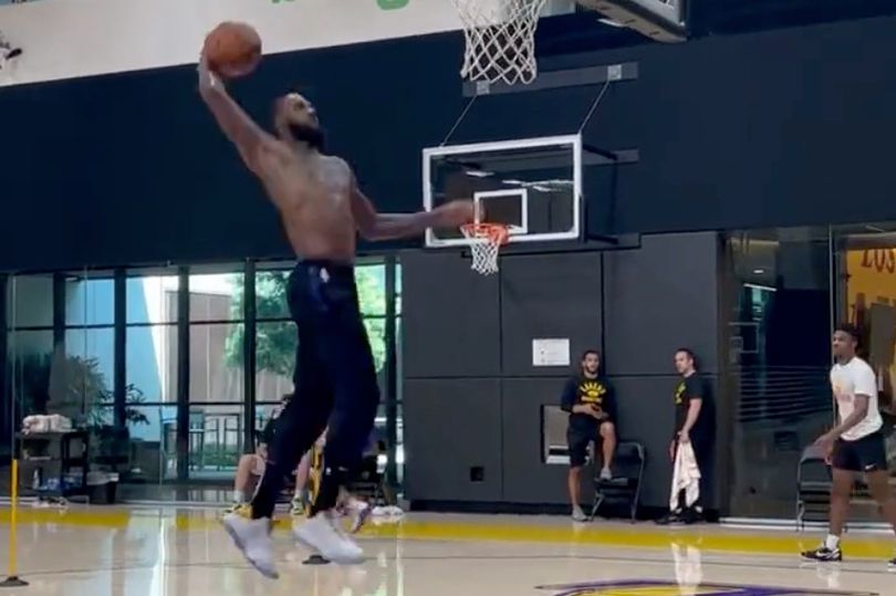 LeBron James and his NBA hopeful teenage sons perform acrobatic dunks in practice clip