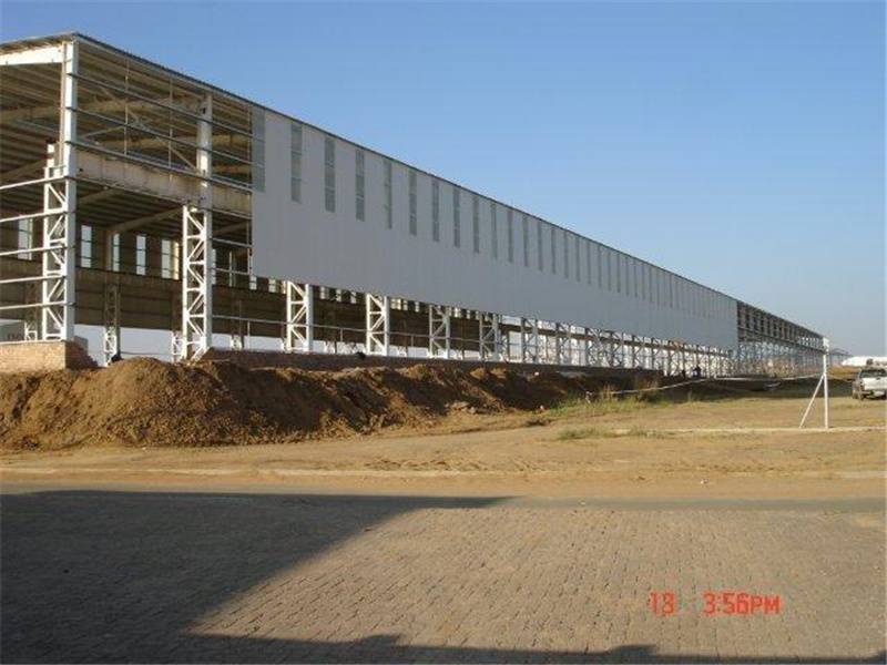 Well-designed Galvanized Steel Structure Brick Factory - Cost-effetive Economic Industry Steel Structure Warehouse  – Xinguangzheng detail pictures