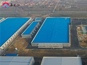 Prefabricated steel structure glass warehouses building design in China steel frame construction factory building plans price