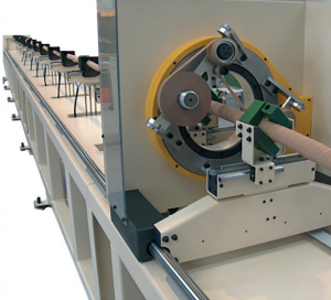 Flexible cable and conductor taping machine