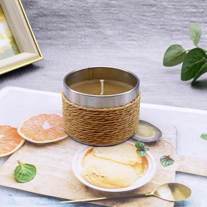 L07 A metal can with colored paper ropes contains scented candles