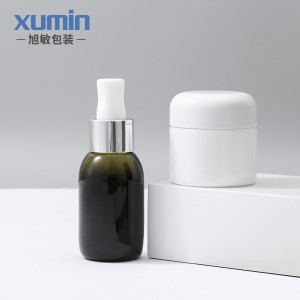 Buy wholesale skin care green glass dropper bottle 50ml with white porcelain bottle glass jar 50g