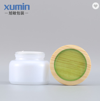 China Manufacturer for Empty Bottles -
 1oz 2oz 50ml 50g white cream jar bamboo lid cosmetic glass jar with glass jar with bamboo lid – Xumin