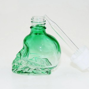 15ml / 30ml / 50ml nagykereskedelmi üres egyedi üveg koponya csepegtetős üveg illóolaj