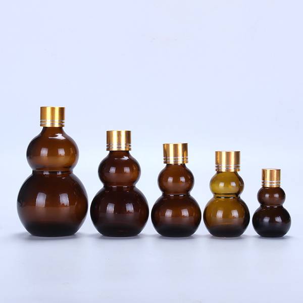 10ml 20ml 30ml 50ml 100ml wholesale gourd shape amber bottle spray empty glass dropper bottle for essential oil Featured Image
