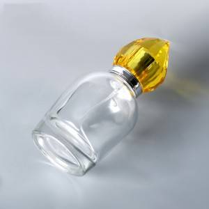 100ml luxury transparent round glass perfume bottle with golden acrylic plastic cap