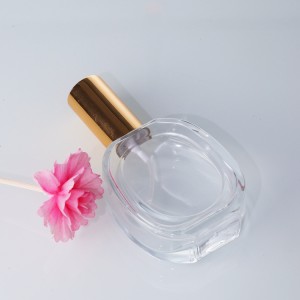 Wholesale spot crystal white material 50ML glass refillable perfume bottle screw mouth press spray empty bottle
