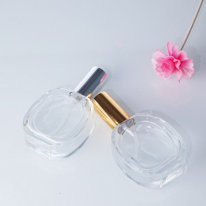 Wholesale spot crystal white material 50ML glass refillable perfume bottle screw mouth press spray empty bottle