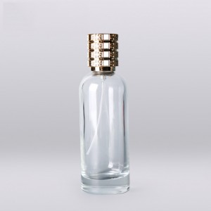 100ml silinder round parfum bottle labels oanpaste ûntwerpe dúdlik lege glês parfum fles fabrikanten mei kroan gouden cap
