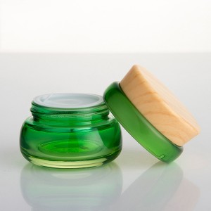 30g 50гр / 50мл 100ml 120ml нов дизајн лист форма зелено стакло слој козметички празни шишиња со бамбус модел пластична капа