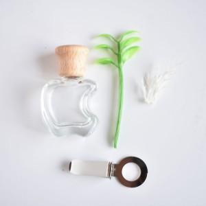 Wholesale custom color apple shape 10ml wooden cap empty glass diffuser car perfume bottle in stock
