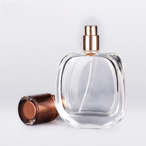 Chine fabricant bouteille verre transparent de parfum 100 ml vide avec bouchon uv de luxe
