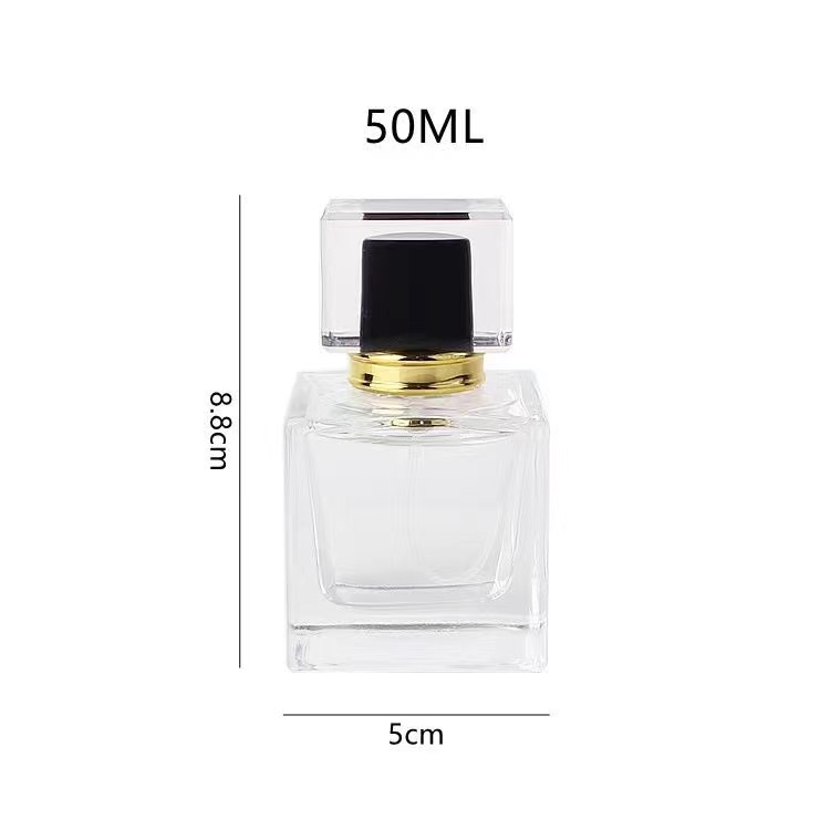 Wholesale cubic shape 50ml perfume glass bottle with lid Featured Image