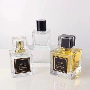 Wholesale cubic shape 50ml perfume glass bottle with lid