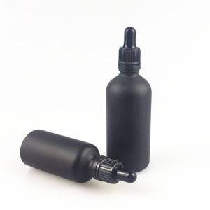 Black essential oil glass bottle with dropper