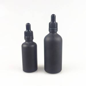 Bouteille en verre d'huile essentielle noire givrée de 30 ml avec compte-gouttes