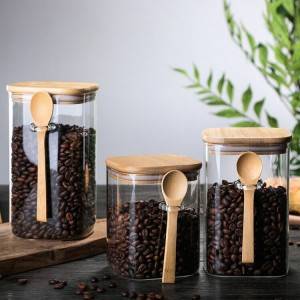 Glass jar with bamboo lid and spoon