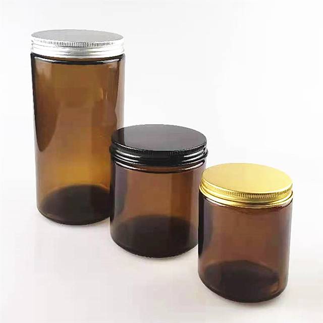 wholesale 100 ml amber glass candle jar with sliver lid Featured Image