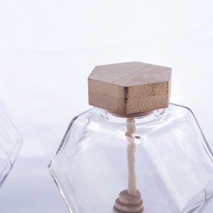Hexagonal glass honey jar with wooden cap
